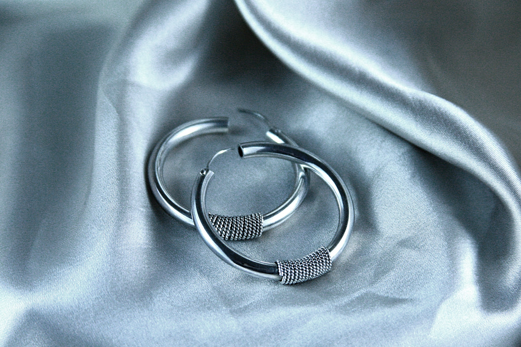 Large Hoop Earrings with Braided Wire Decoration